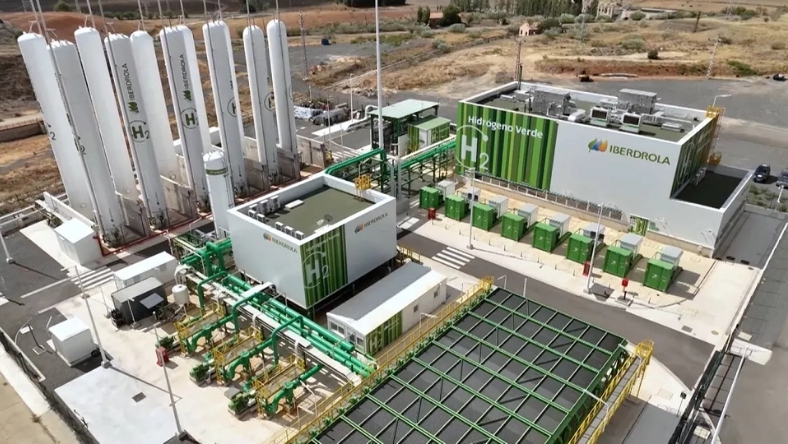 Industrial hydrogen plant with vertical storage tanks and processing units